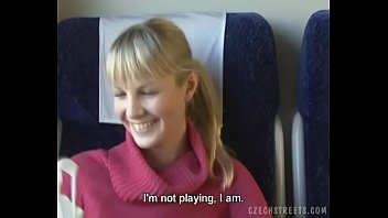 Shameless blonde on the train licking the boner of a cheeky guy